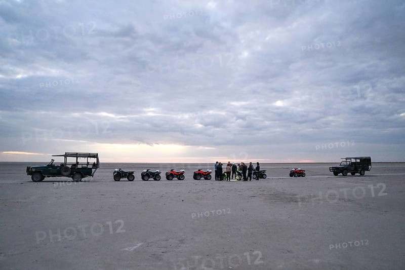 Tourists on a quad bike tour to the Makgadikgadi Salt Pans, Makgadikgadi Pans National Park, Gweta, Central District, Botswana