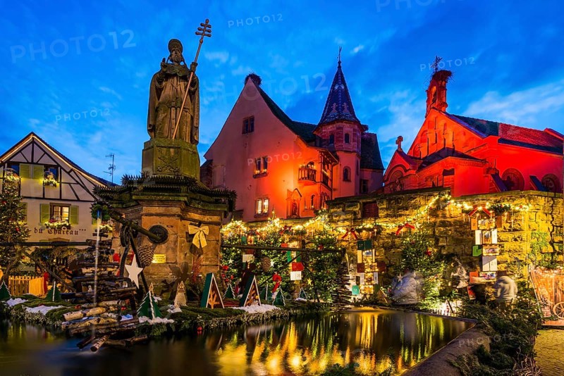 Houses illuminated and decorated for Christmas, Christmas market, blue hour, Eguisheim, Haut-Rhin department, Grand Est region, Alsace, France