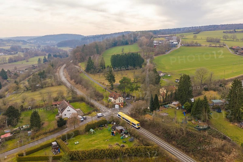Aerial view of a hilly landscape with train, fields and small villages, acceptance of the Hermann Hesse Railway, Calw, Black Forest, Germany