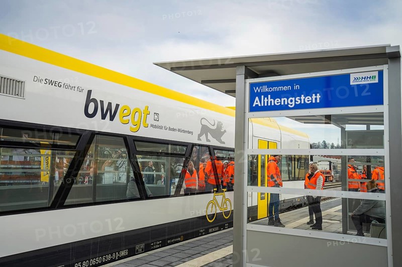 Passengers board a train at Althengstett station, taken by the Hermann Hesse Railway, Calw, Black Forest, Germany