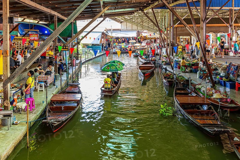 Wooden boats on the Damneon Saduak floating markets channel, near Bangkok, Ratchaburi district, Thailand
