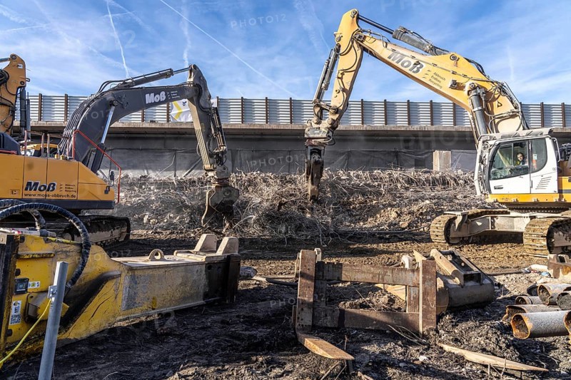 Demolition of the 120 meter long motorway bridge of the A516, across Teutoburger Straße in Oberhausen-Sterkrade, the bridge, built in 1970 was severely damaged, traffic continues to roll on the still existing West Bridge, after the demolition, the eastern part is rebuilt using a process unique in the world, 40 meter long precast concrete beams are assembled one after the other, reducing the construction period from 24 to 7 months after the completion of this bridge Will the western part also be rebuilt, North Rhine-Westphalia, Germany