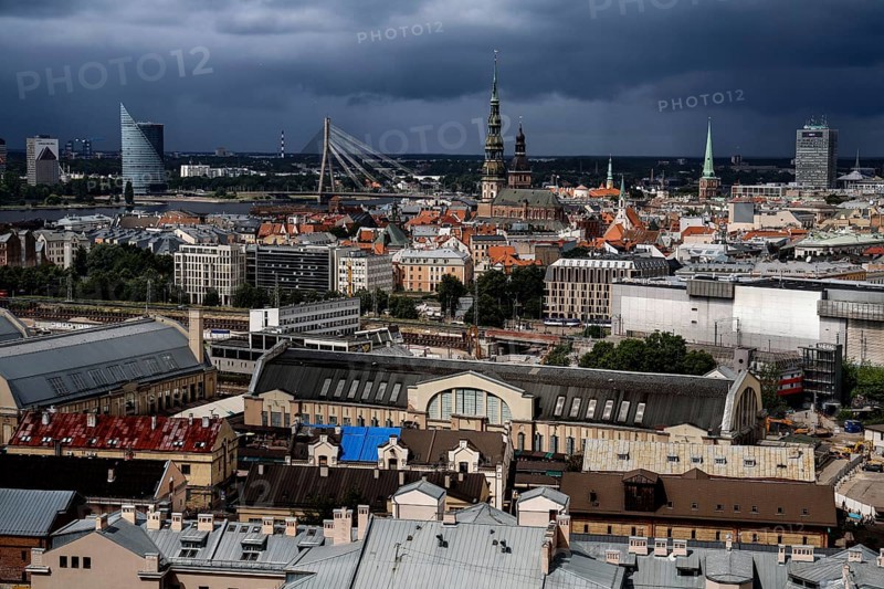 View of Riga with a combination of market buildings and distinctive church towers, Riga, Latvia, Latvia