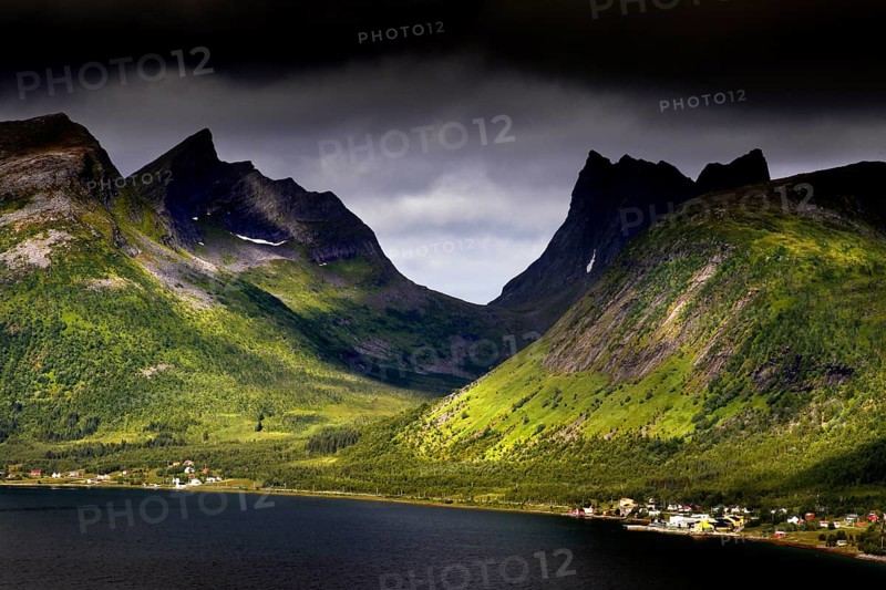 Impressive mountain landscape with impressive light incidence in Bergsbotn, Senja, Norway