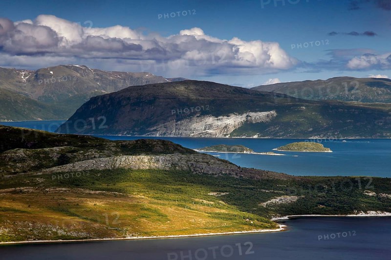 Far-reaching view of Lyngenfjord under a partly cloudy sky, Lyngenfjord, Troms og Finnmark, Norway