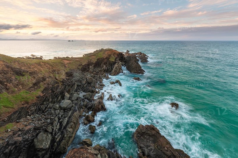 Sunset with wide view over the east coast at Cape Byron, New South Wales, Australia