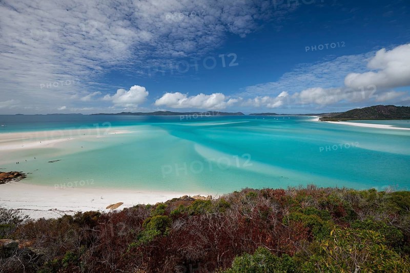 Sunny daytime view from Hill Inlet lookout over Whitehaven Beach, Whitsunday Island, Queensland, Australia