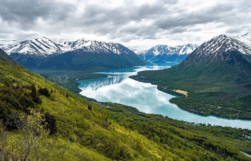 View of snowy mountains and turquoise lake Kenai Lake, Slaughter Ridge Trail, Cooper Landing, Kenai Peninsula, Alaska, USA