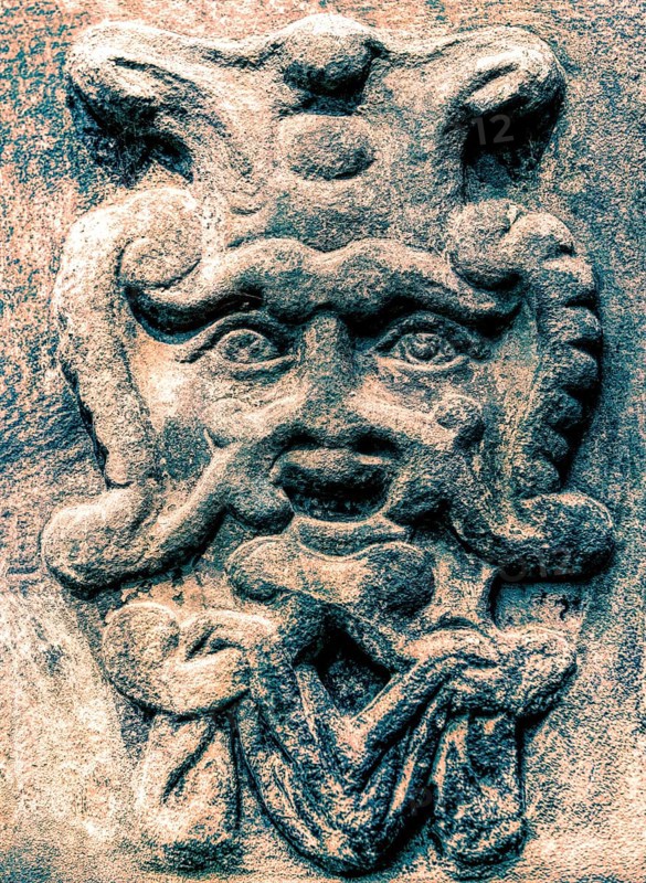 Old stone mask, face on a wall, Welf Castle of Herzberg, Herzberg am Harz, district of Göttingen, Lower Saxony, Germany, digitally edited