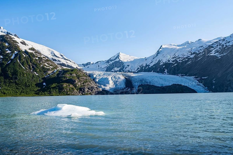 Snowy mountains and glaciers Portage Glacier on Portage Lake glacial lake, Chugach National Forest, Alaska, USA
