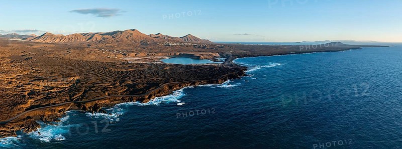 Coast with lava fields, volcanic landscape near Los Hervideros, in the evening light, aerial view, Lanzarote, Canary Islands, Spain