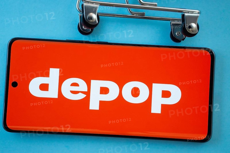 Dhaka, Bangladesh- 03 July 2025: Smartphone screen showing the Depop logo with shopping cart wheels on a blue background