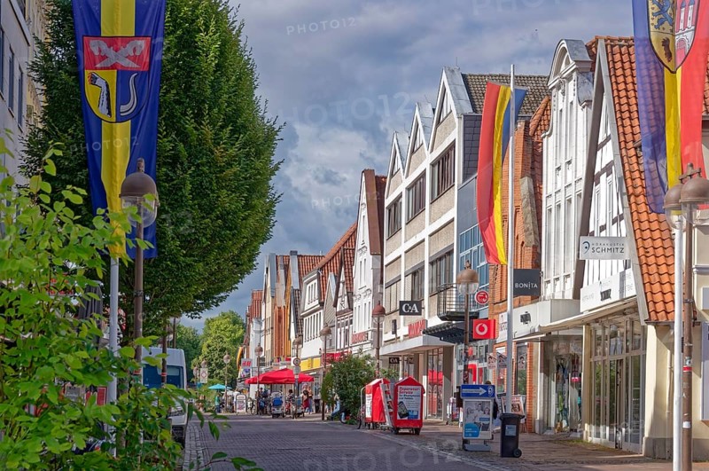 Buildings and shops in Lange Straße in the historic old town centre of Nienburg an der Weser. Nienburg, Lower Saxony, Germany