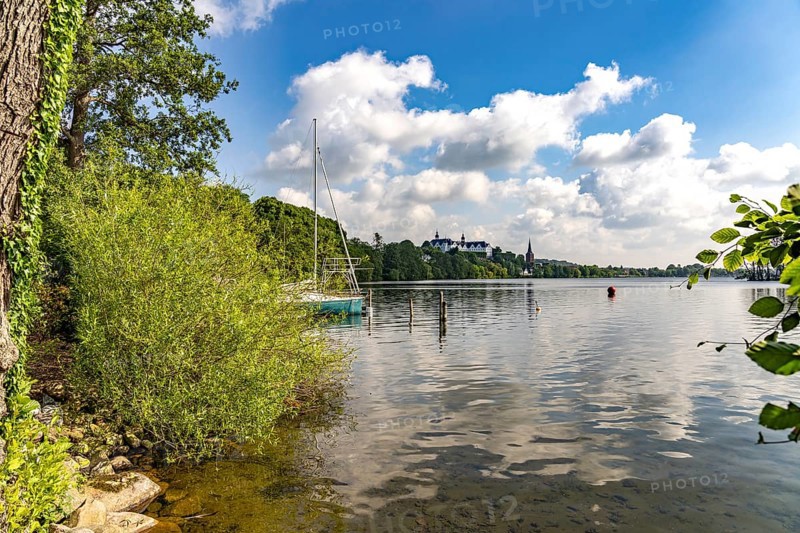 The Great Plön Lake, Nikolai Church and Plön Castle in Plön, Schleswig-Holstein, Germany
