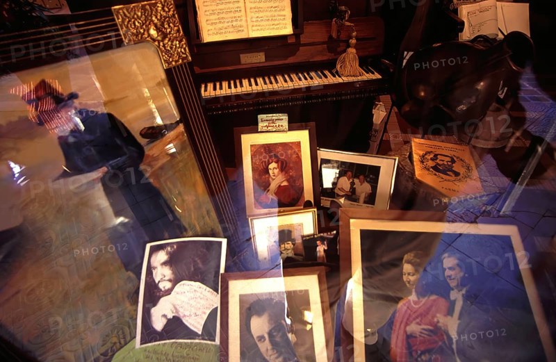 Shop window decoration in honor of Giuseppe Verdi, with pictures of opera Opera singer and performances, Busseto, Province of Parma, Emilia-Romagna, Italy
