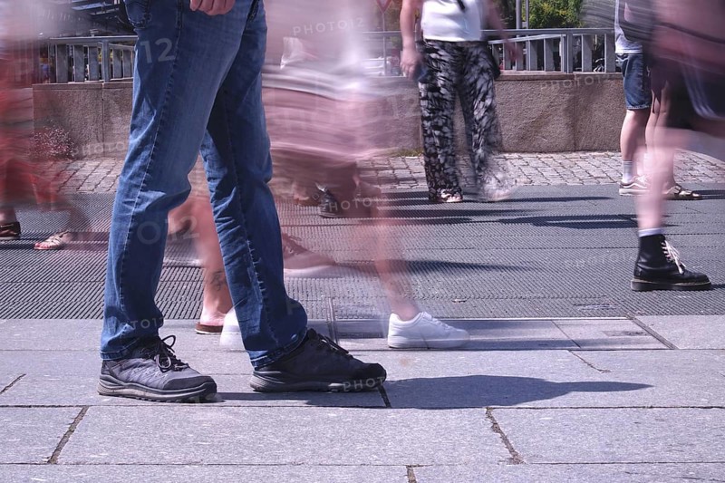 Passers-by in a summer city, shopping, Germany
