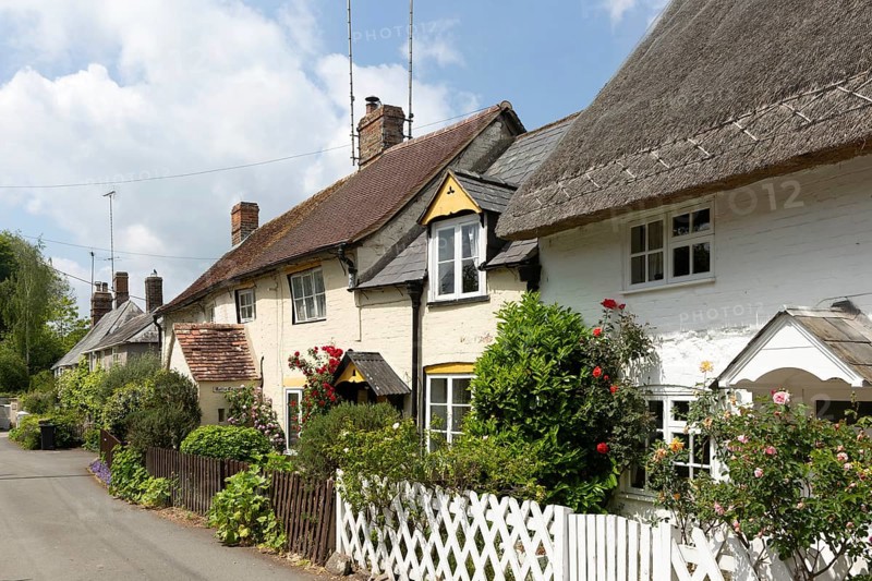 Attractive historic cottages in village of Avebury, Wiltshire, England, UK