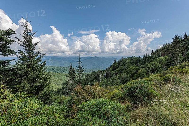 Smoky haze over the foliage on the mountainsides along the Blue Ridge Parkway in the Smoky Mountains near Cherokee, North Carolina, USA