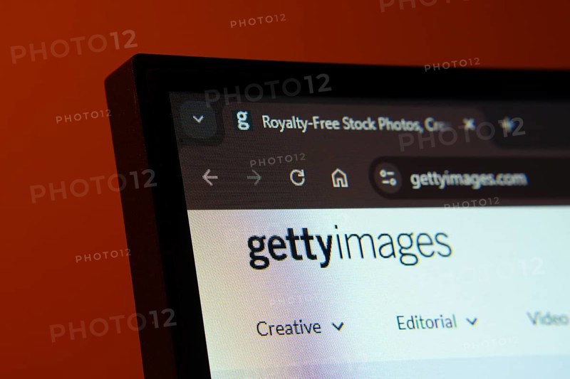 Close-up of a computer screen displaying the Getty Images web interface in dark mode