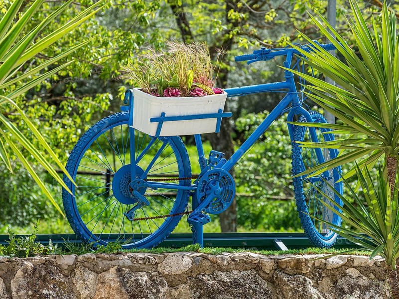 Decorated bicycle, cycle path Via Verde Del Aceite, village Dona Menica, Andalusia, Spain