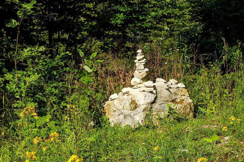 Cairn to mark the edge of the path, near the Schertelshöhle cave, Swabian Alb, Germany