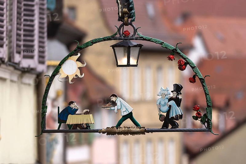 Nose shield with inn scene and wedding couple, Bamberg, Upper Franconia, Bavaria, Germany