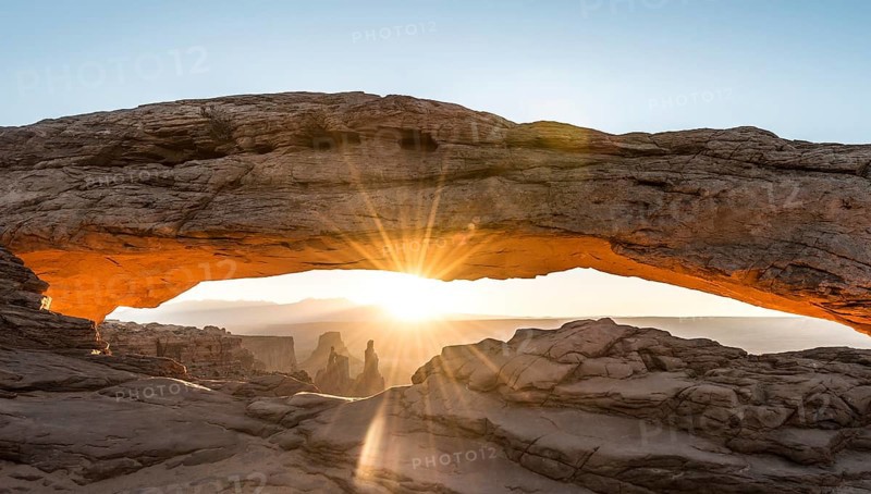 View through Natural Arch, Mesa Arch, Sunrise, Grand View Point Road, Island in the Sky, Canyonlands National Park, Moab, Utah, USA