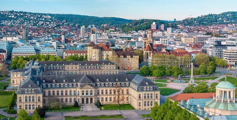 City view of Stuttgart. Aerial view. City centre on the Schlossplatz with New Palace, Old Palace and Collegiate Church. Stuttgart, Baden-Württemberg, Germany