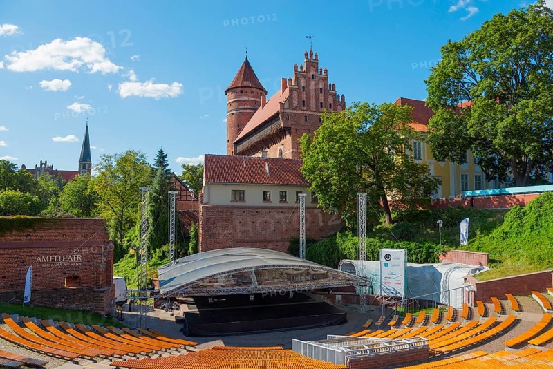 Medieval castle with open-air amphitheatre and surrounding trees, castle and amphitheatre, Olsztyn, Olsztyn, Warmia-Masuria, Poland