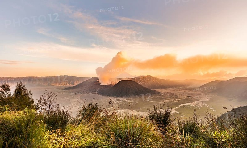 Sunrise, smoking volcano, Gunung Bromo, Mount Batok, Mount Kursi, Mount Semeru, Bromo Tengger Semeru National Park, Java, Indonesia
