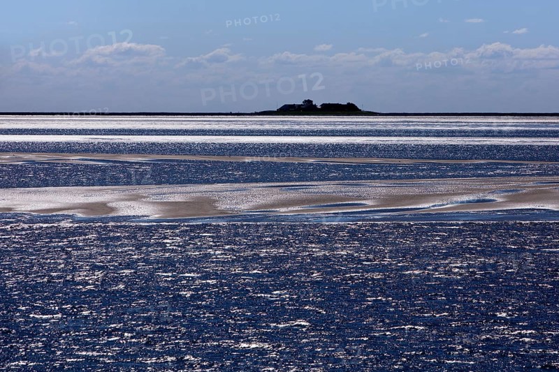 Schleswig-Holstein Wadden Sea National Park with a terp on the Hallig Langeness, North Frisia, Germany