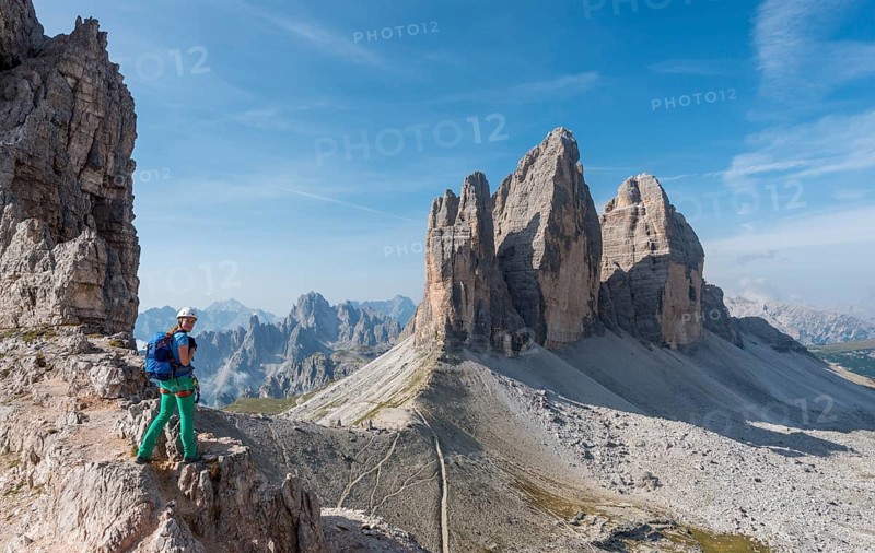 Hiker on the via ferrata to Patternkofel, Northern walls of the Three Peaks, Sesto Dolomites, South Tyrol, Trentino-South Tyrol, Alto-Adige, Italy