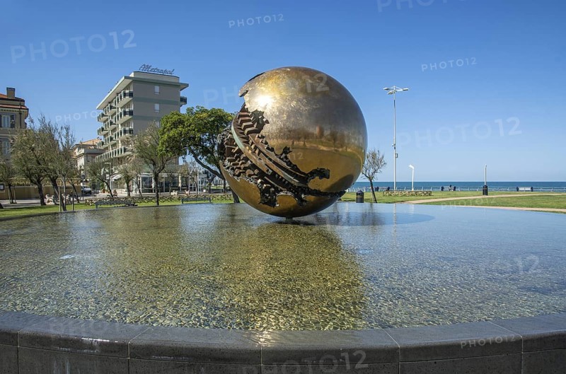 Sfera Grande, sculpture by the artist Arnaldo Pomodoro on the promenade in Pesaro, Marche region, Italy, Southern Europe