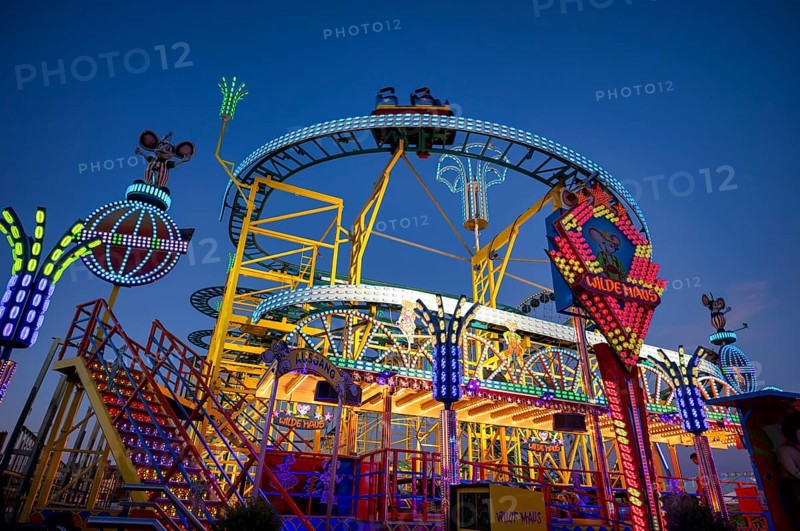Rollercoaster Wild Mouse, rides, neon lights, Cannstatter Wasen, blue hour, funfair, spring festival, folk festival, Bad Cannstatt, Stuttgart, Baden-Württemberg, Germany