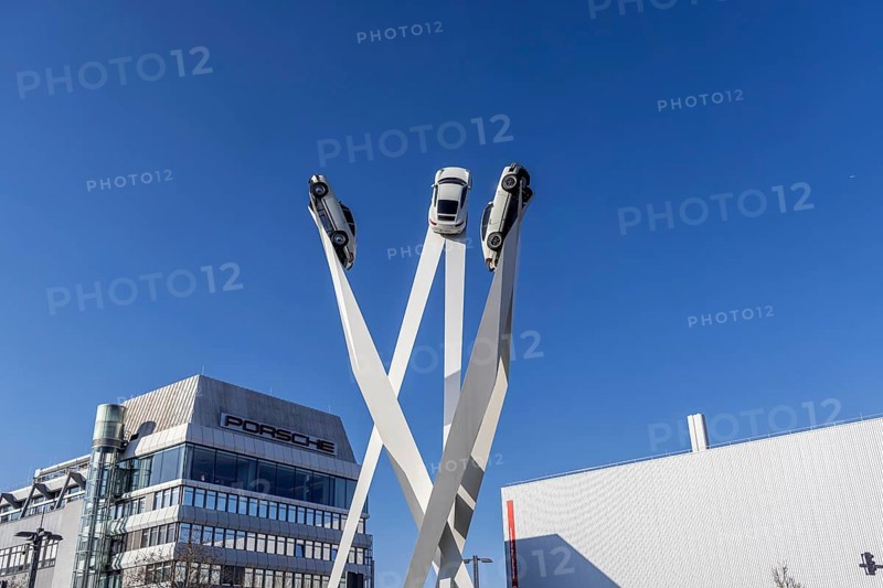 Inspiration 911 artwork by Gerry Judah: three steles, each presenting a Porsche 911 at a height of up to 24 metres. Company headquarters at Porscheplatz, Zuffenhausen, Stuttgart, Baden-Württemberg, Germany