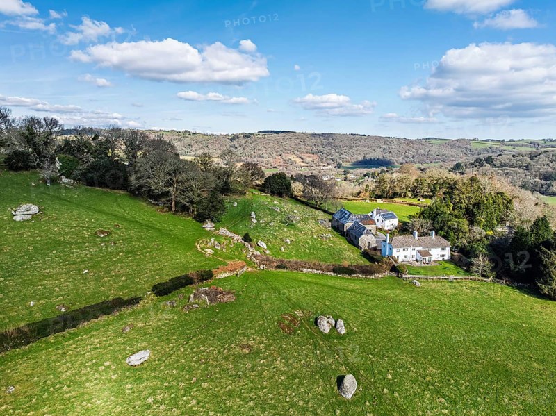 Farms and Woods over East Dartmoor National Nature Reserve from a drone, Yarner Wood, Lustleigh, Newton Abbot, Devon, England, United Kingdom