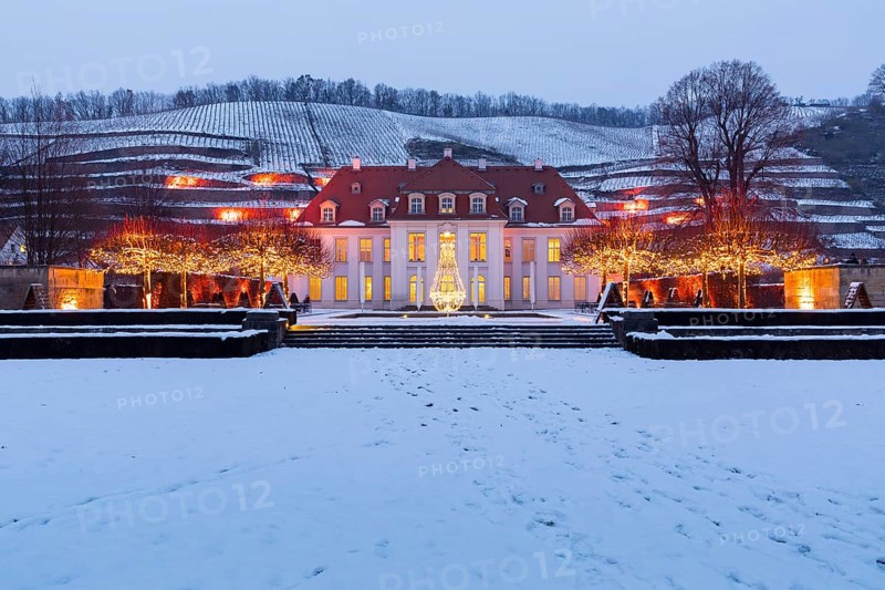 Wackerbarth's winter magic, castle and vineyards with Christmas lights and snow, Radebeul, Saxony, Germany