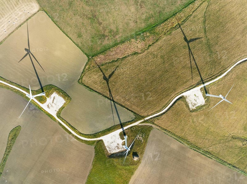 Windmills on a wind farm near Zahara de los Atunes, aerial view, drone shot, Cádiz province, Andalusia, Spain