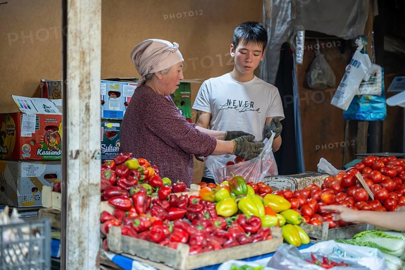 Stall selling vegetables at the Osh Bazaar, Bishkek, Kyrgyzstan