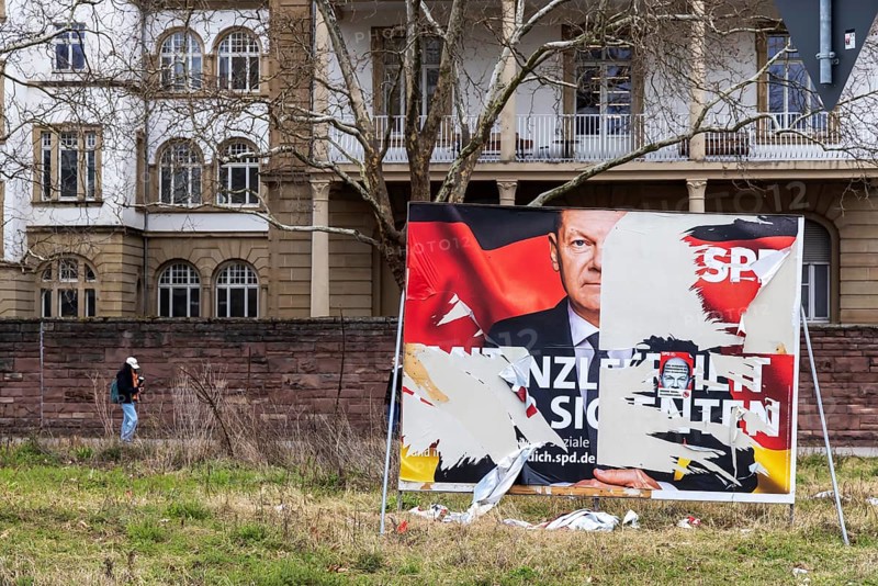 Election poster of the SPD party with Olaf Scholz for the Bundestag election 2025. BTW25. The large poster was destroyed by vandals, it is a symbol for the failed Federal Chancellor. Karlsruhe, Baden-Württemberg, Germany