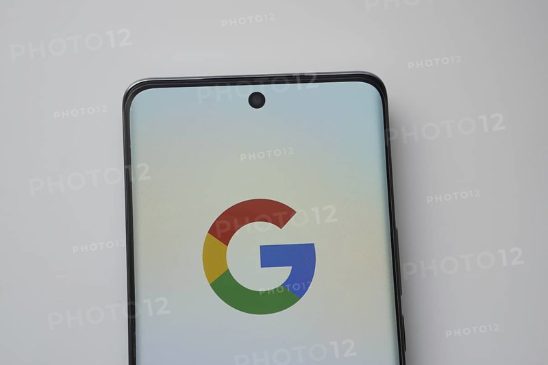 The logo of the Google is displayed on a smartphone screen