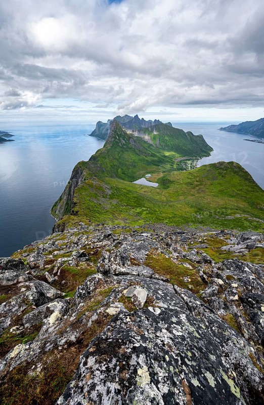 View of fjords Øyfjorden and Mefjorden, mountains on the headland of Fjordgård, view from Barden mountain, Senja, Norway