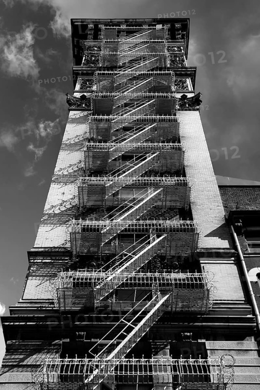 High-rise building with fire escapes Downtown, New York City, USA