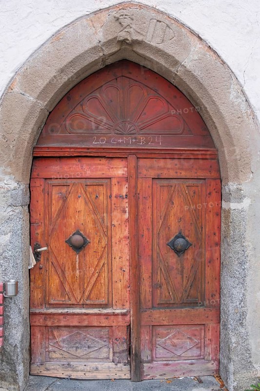 View of an old double wooden door, St. Lorenzen, Bolzano, Trentino, South Tyrol, Italy