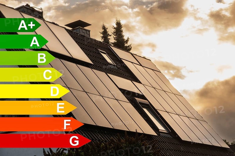 Scaffolding and solar panels on the roof of a detached house in Essen, energy efficiency classes according to the GEG, Essen, Germany