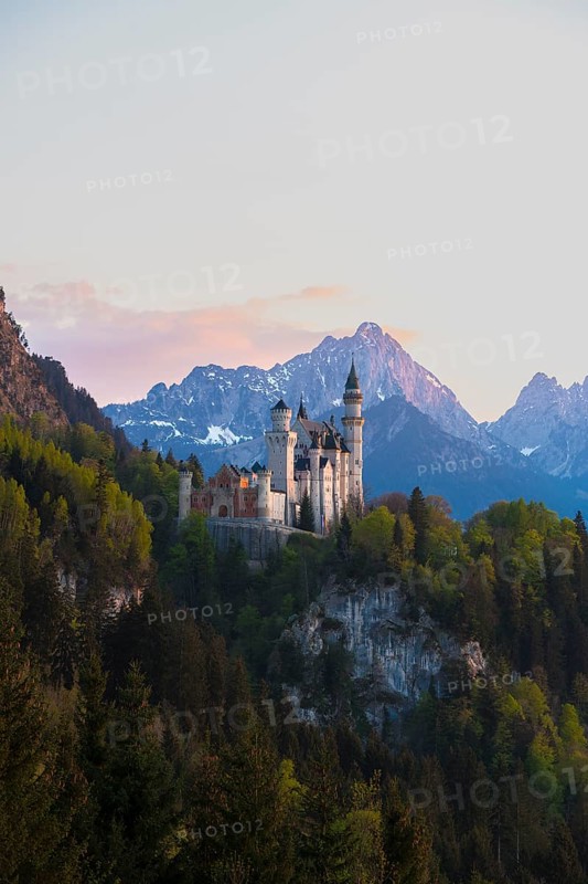 Romantic Neuschwanstein Castle in front of picturesque Alps, Schwangau near Füssen, Ostallgäu district, Swabia, Bavaria, Germany