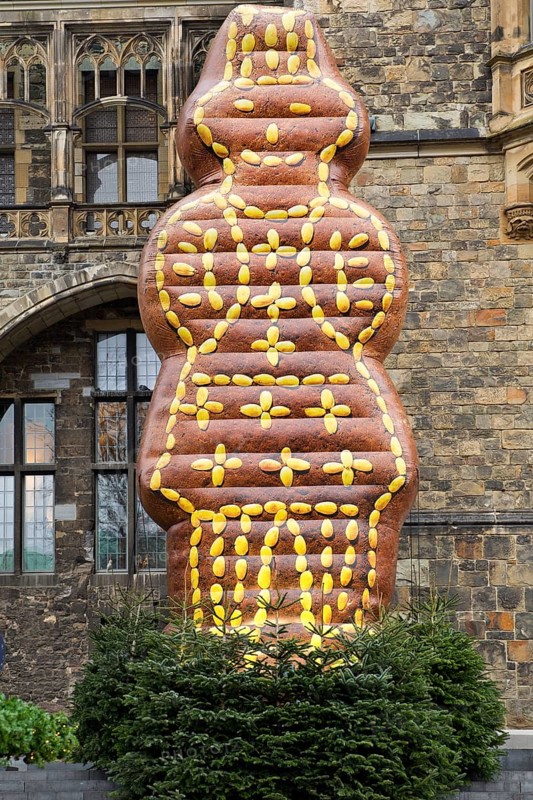 Artificial Printenmann in front of the town hall as a landmark at the Christmas market, Aachen, North Rhine-Westphalia, Germany