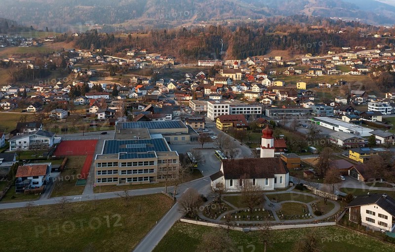 Drone image, residential buildings, settlement area, parish church, Thuringia, Großes Walsertal, Vorarlberg, Austria