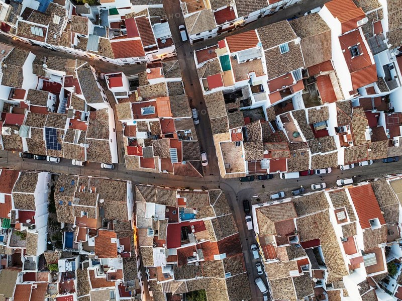Streets and rooftops in the White Town of Olvera. Aerial view. Drone shot. Cádiz province, Andalusia, Spain