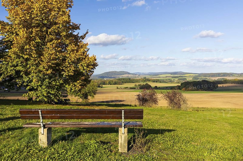 Bench with a view of Löbauer Berg and the Upper Lusatian Highlands in Kottmarsdorf, Kottmar, Upper Lusatia, Saxony, Germany